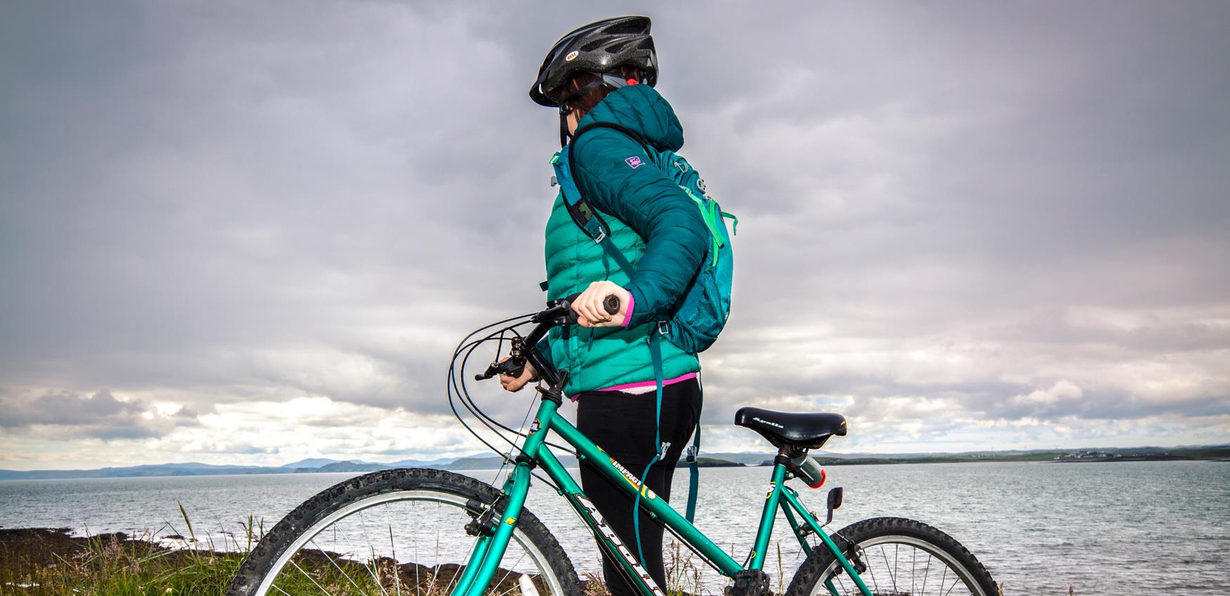 Bike and person near the sea
