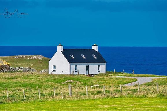 Kettle Cottage blue sky & sea