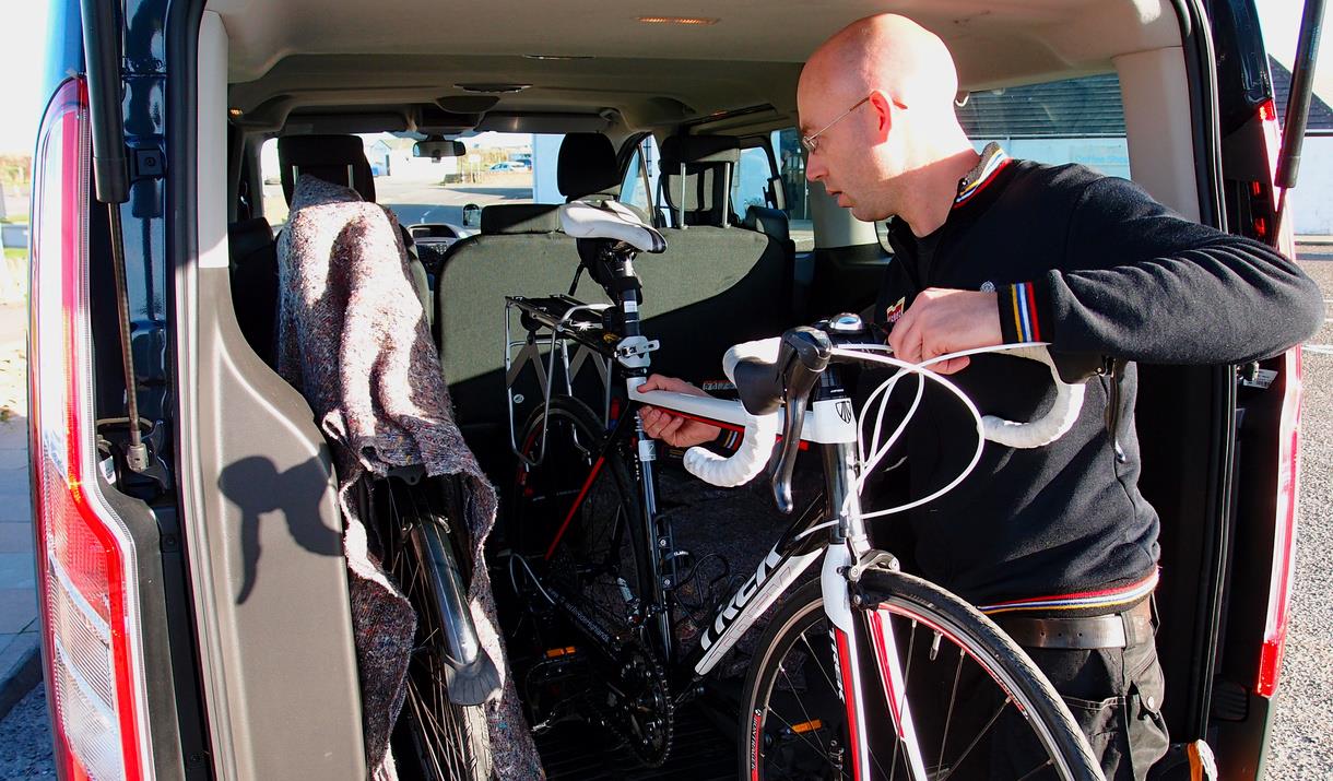 Ticket To Ride bikes inside van