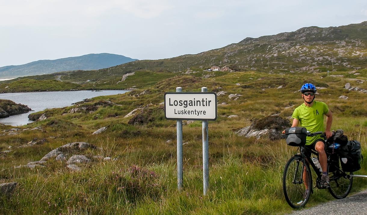 Ticket To Ride cyclist at Luskentyre road sign