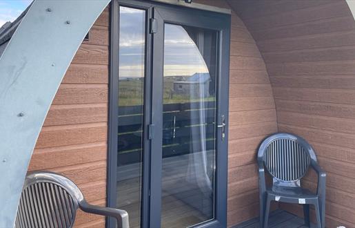 South Dell Pod front door with chairs