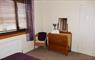 Lily Pond Cottage chair & sideboard in bedroom