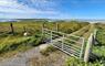 John's Bunkhouse gate & path leading to beach
