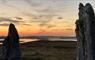 Calanais IV at Sunset - 2 stones and loch in background