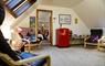 Ceol Na Mara lounge area with fridge