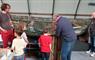 Grimsay Community Association (GCA) - Heritage Centre visitors inspecting a boat