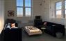 Tigharry Schoolhouse lounge with sofas and table