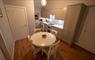 Am Bliochan self catering cottage north uist - Kitchen with double doors to living room, door to porch and door to hall.