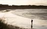 Benbecula: walker on Liniclate beach