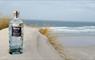 Eat Drink Hebrides - Isle of Barra Distillery gin bottle on the sand
