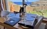 A dining table overlooking the ocean