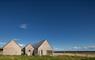 Lewis Longhouse & blue sky