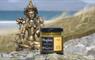 Jar of mustard and a bronze Hindi statue
