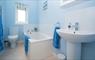 Bathroom with full sized bath and heated towel rail. Heisgeir View Holiday Cottage, North Uist Outer Hebrides