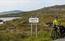 Ticket To Ride cyclist at Luskentyre road sign