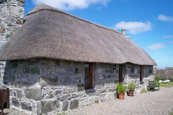 Taigh Neill stone house with thatch