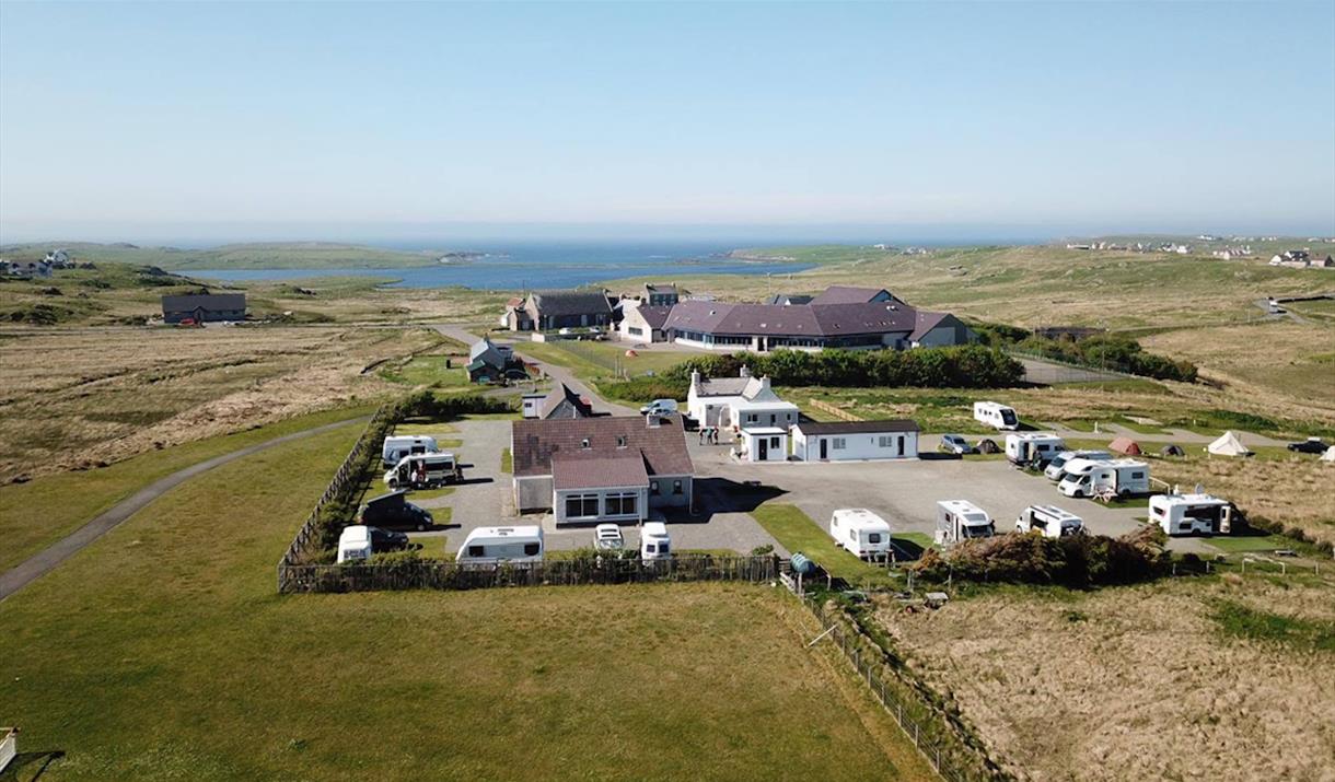Eilean Faroich Campsite - Aerial Image with Atlantic ocean in the background Eilean Faroich Campsite - Aerial Image with Atlantic ocean in the background